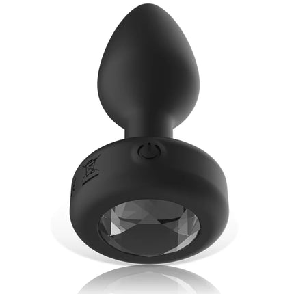 Ibiza anal-stecker mit fernbedienung größe s aus schwarzem silikon mit facettiertem kristalleinsatz und power-taste am fuß