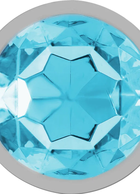 Intense analstecker aus aluminiummetall mit rundem blauem facettiertem kristall in silberner fassung größe s
