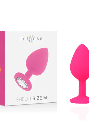 Ein intensiver shelki m anal plug in leuchtendem pink mit glattem silikon und klarem kristall am fuß