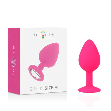 Ein intensiver shelki m anal plug in leuchtendem pink mit glattem silikon und klarem kristall am fuß