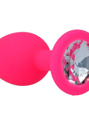 Ein leuchtend pinker silikon analplug intense shelki s mit klarem facettiertem kristall im runden kopf