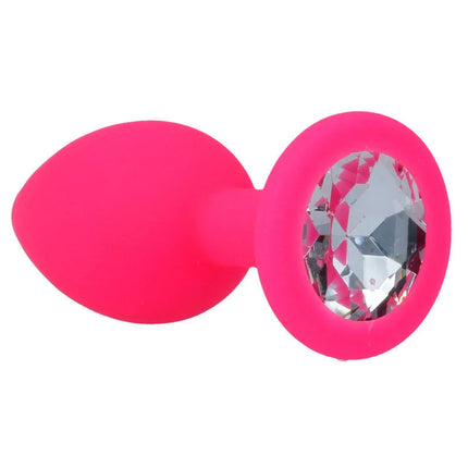 Ein leuchtend pinker silikon analplug intense shelki s mit klarem facettiertem kristall im runden kopf