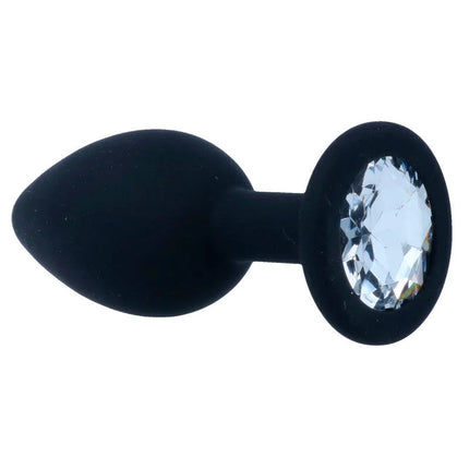 Schwarzer silikon analplug mit klar facettiertem kristall im runden sockel intense shelki s plug anal schwarz