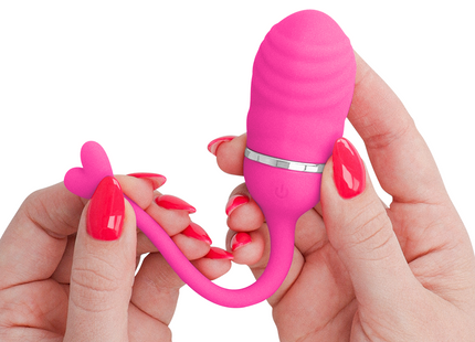 Intense sookie fernbedienungs-vibrationsei rosa aus silikon mit silbernem ring und herzförmigem griff