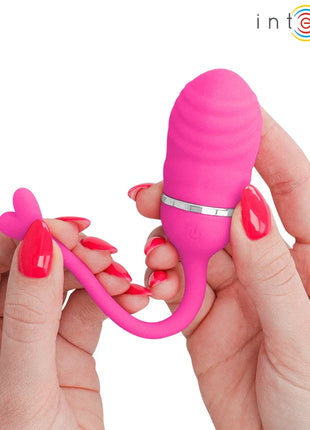 Intense sookie fernbedienungs-vibrationsei rosa aus silikon mit silbernem ring und herzförmigem griff