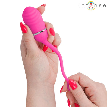 Ein intensives pinkes sookie fernbedienungs-vibrationsei mit glattem, geripptem silikonkörper und flexiblem kabel