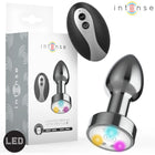 INTENSE - VIBRIERENDER ANALPLUG AUS METALL MIT LED-LEUCHTEN UND FERNBEDIENUNG - GRÖSSE S
