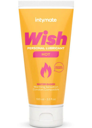 Ein lebhaft orangefarbener schlauch intymate wish heißes wasserbasiertes gleitmittel mit weißem deckel und pinkem logo, kondomkompatibel