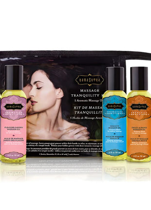 Set aus fünf bunten glasflaschen mit schwarzen kapseln und verschiedenen aromatischen massageölen von kamisama berührendes massageset