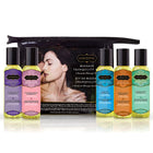 Set aus fünf bunten glasflaschen mit schwarzen kapseln und verschiedenen aromatischen massageölen von kamisama berührendes massageset