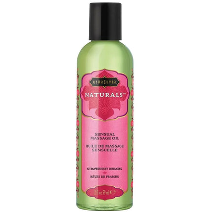 Ein durchscheinendes grünes fläschchen des kama sutra natürlichen massageöls erdbeertume 59 ml mit schwarzem verschluss und rosa blumenetikett