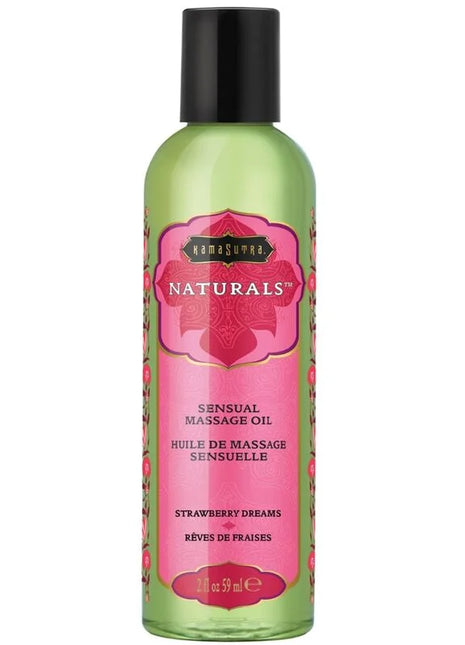 Ein durchscheinendes grünes fläschchen des kama sutra natürlichen massageöls erdbeertume 59 ml mit schwarzem verschluss und rosa blumenetikett