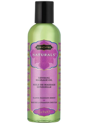 Eine durchscheinend grüne Flasche Kamasutra natürliches Massageöl Island Passion Berry mit schwarzem Verschluss und lila Blumenetikett