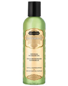 Eine durchscheinend grüne flasche kamasutra natürliches massageöl vanille sandelholz 59 ml mit schwarzem deckel und goldgeprägtem etiket