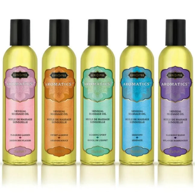 Fünf flaschen kamasutra set 15 aromatischer sinnlicher massageöl in verschiedenen farben mit schwarzen verschlüssen
