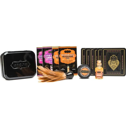 Schwarze metallic tin mit kunstvoll geprägt silbernem logo kamasutra weekender tin kit tropischer griff