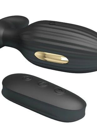 Schwarzer silikon analvibrator kelly plug mit goldakzent und gerillter oberfläche plus passender fernbedienung