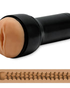 Kiiroo feel stroker masturbator stimulator mit schwarzer zylindrischer grundlage und beige silikonkopf mit strukturierter innenseite