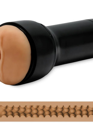 Kiiroo feel stroker masturbator stimulator mit schwarzer zylindrischer grundlage und beige silikonkopf mit strukturierter innenseite