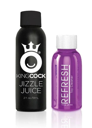 Schwarze flasche kingcock jizzle juice neben lila translucent flasche refresh toy cleaner beim realistische naturlicher ejakulator penis 27.94 cm
