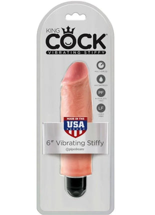 Ein pfirsichfarbener vibrator king cock aus silikon mit schwarzer basis und realistischer form 15,24 cm lang