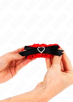 KINK - ELASTISCHE HANDGELENKSFESSELN AUS SPITZE MIT ROTEN HERZDETAILS VERSTELLBAR 22-35 CM