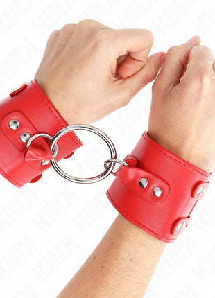 KINK - FESTE HANDGELENKFESSELN MIT RING UND NIETEN VERSTELLBAR ROT 17-22 CM X 6,5 CM
