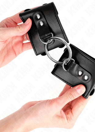 KINK - FESTE HANDGELENKFESSELN MIT RING UND NIETEN VERSTELLBAR SCHWARZ 17-22 CM X 6,5 CM