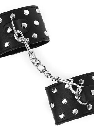 KINK - HANDGELENKFESSELN MIT DRUCKVERSCHLUSS VOLLER NIETEN SCHWARZ VERSTELLBAR 19-24 CM X 5,5 CM
