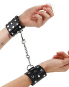 KINK - HANDGELENKFESSELN MIT DRUCKVERSCHLUSS VOLLER NIETEN SCHWARZ VERSTELLBAR 19-24 CM X 5,5 CM