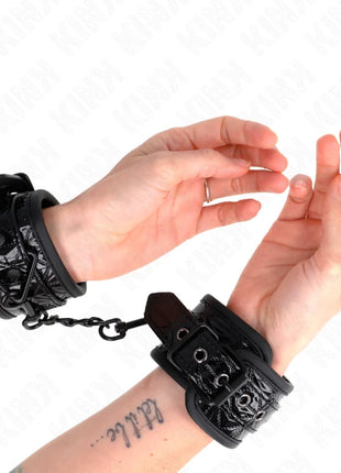 KINK - HANDGELENKFESSELN MIT RAUTENMUSTER SCHWARZ VERSTELLBAR 17-26 CM X 5,5 CM