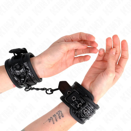 KINK - HANDGELENKFESSELN MIT RAUTENMUSTER SCHWARZ VERSTELLBAR 17-26 CM X 5,5 CM