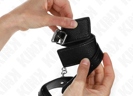 KINK - HANDGELENKFESSELN MIT SCHLANGENMUSTER SCHWARZ VERSTELLBAR 20-28 CM X 5,4 CM