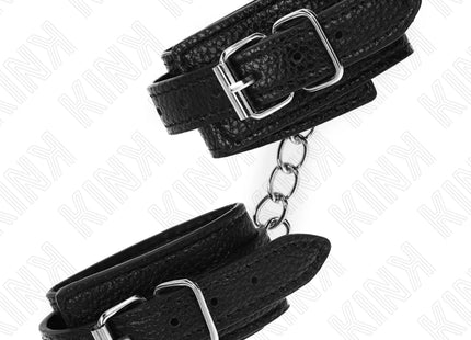 KINK - HANDGELENKFESSELN MIT SCHLANGENMUSTER SCHWARZ VERSTELLBAR 20-28 CM X 5,4 CM