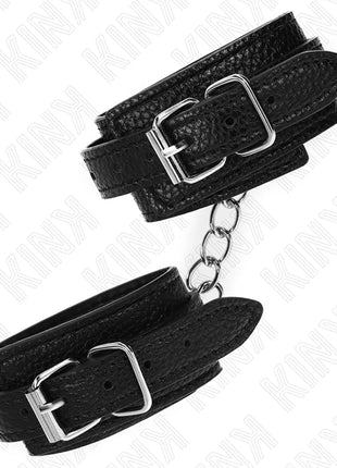 KINK - HANDGELENKFESSELN MIT SCHLANGENMUSTER SCHWARZ VERSTELLBAR 20-28 CM X 5,4 CM