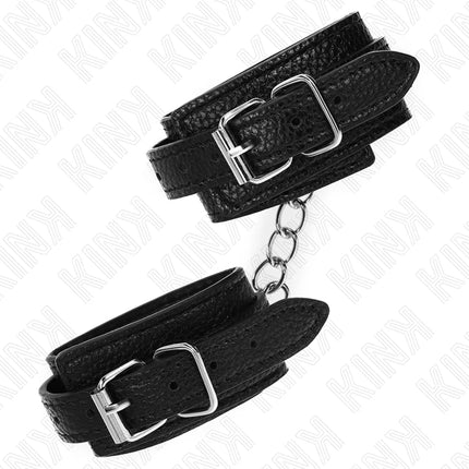 KINK - HANDGELENKFESSELN MIT SCHLANGENMUSTER SCHWARZ VERSTELLBAR 20-28 CM X 5,4 CM