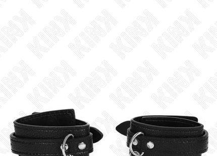 KINK - HANDGELENKFESSELN MIT SCHLANGENMUSTER SCHWARZ VERSTELLBAR 20-28 CM X 5,4 CM