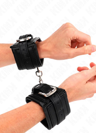 KINK - HANDGELENKFESSELN MIT STRASS-SCHNALLE SCHWARZ VERSTELLBAR 25-32 CM X 5,5 CM