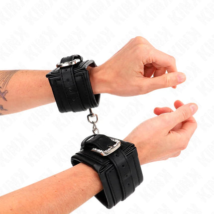 KINK - HANDGELENKFESSELN MIT STRASS-SCHNALLE SCHWARZ VERSTELLBAR 25-32 CM X 5,5 CM