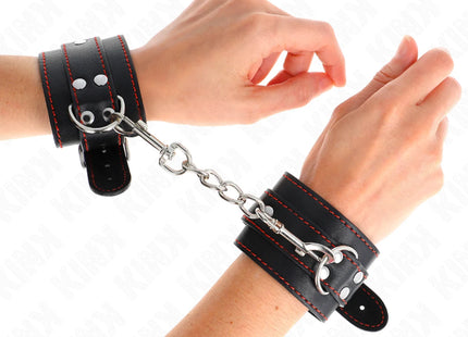 KINK - HANDGELENKFESSELN SCHWARZ MIT ROTEM FUTTER VERSTELLBAR 20-28 CM X 5,5 CM