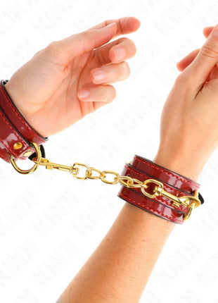 KINK - JOANNA ANGEL HANDGELENKMANSCHETTEN ROT VERSTELLBAR MIT GOLDKETTE 16,5-26 CM X 4 CM