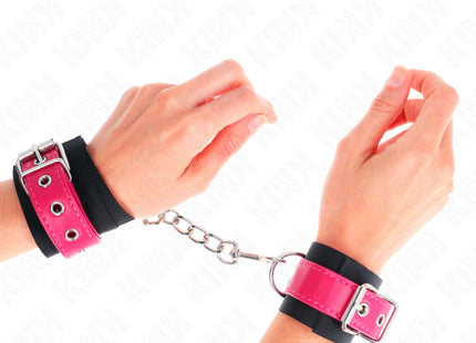 KINK - NYLON HANDGELENKFESSELN SCHWARZ MIT KUNSTLEDERGÜRTEL HIMBEERROSA VERSTELLBAR 19-29 CM X 5,1 CM