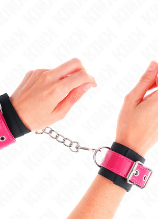 KINK - NYLON HANDGELENKFESSELN SCHWARZ MIT KUNSTLEDERGÜRTEL HIMBEERROSA VERSTELLBAR 19-29 CM X 5,1 CM