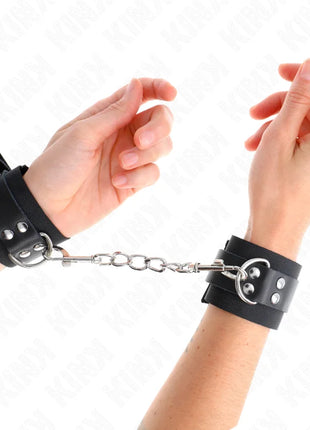 KINK - NYLON HANDGELENKFESSELN SCHWARZ MIT LEDERGURTE SCHWARZ VERSTELLBAR 19-29 CM X 5,1 CM