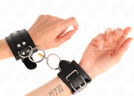 KINK - O-RING VERRIEGELTE HANDGELENKFESSELN SCHWARZ VERSTELLBAR 20-28 CM X 5,5 CM