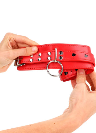 KINK - ROTE HANDGELENKSFESSELN MIT SCHWARZER HERZEINLAGE VERSTELLBAR 21-28 CM X 5,5 CM