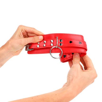 KINK - ROTE HANDGELENKSFESSELN MIT SCHWARZER HERZEINLAGE VERSTELLBAR 21-28 CM X 5,5 CM