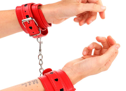 KINK - ROTE HANDGELENKSFESSELN MIT SCHWARZER HERZEINLAGE VERSTELLBAR 21-28 CM X 5,5 CM