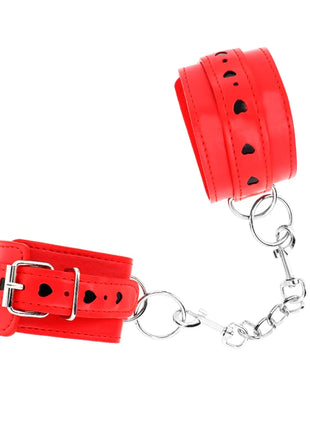 KINK - ROTE HANDGELENKSFESSELN MIT SCHWARZER HERZEINLAGE VERSTELLBAR 21-28 CM X 5,5 CM