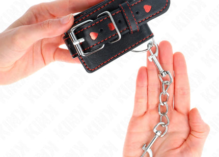 KINK - SCHWARZE HANDGELENKFESSELN MIT ROTER HERZEINLAGE VERSTELLBAR 21-28 CM X 5,5 CM